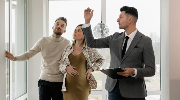 real-estate-appraiser-showing-the-property-to-a-couple-scottsdale-az